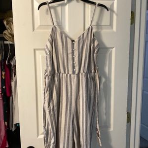 long striped jumpsuit with waist tie and pockets worn once